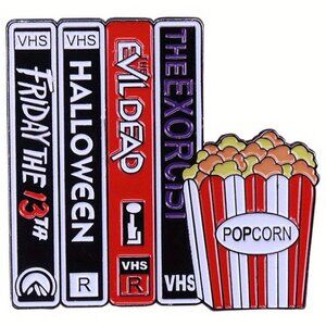 HORROR CLASSICS STACK OF VHS TAPES & POPCORN OIL DRIPPED ENAMEL PIN  BROOCH NWT